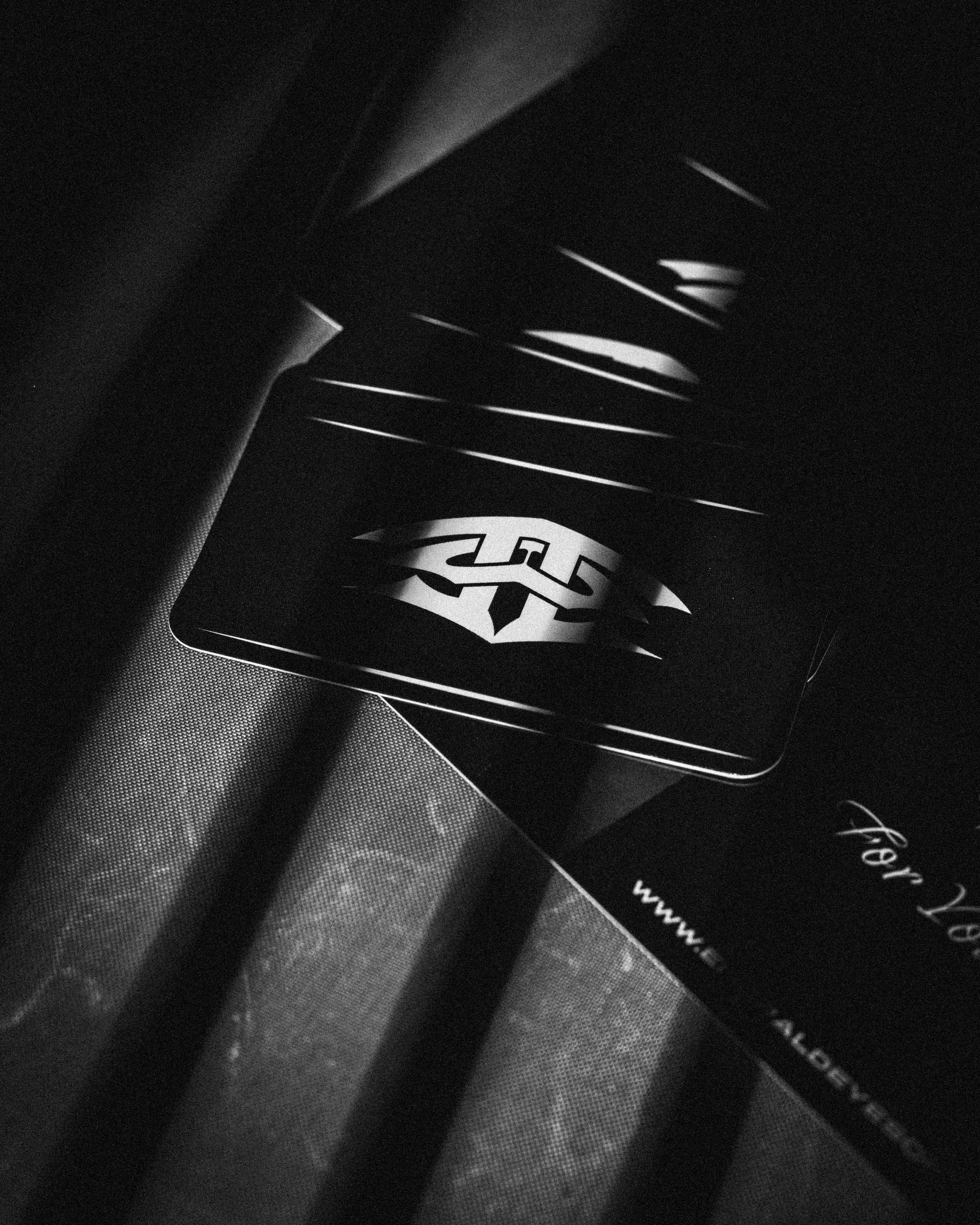 Emerald Eyes tag and product detail from the limited-run clothing brand